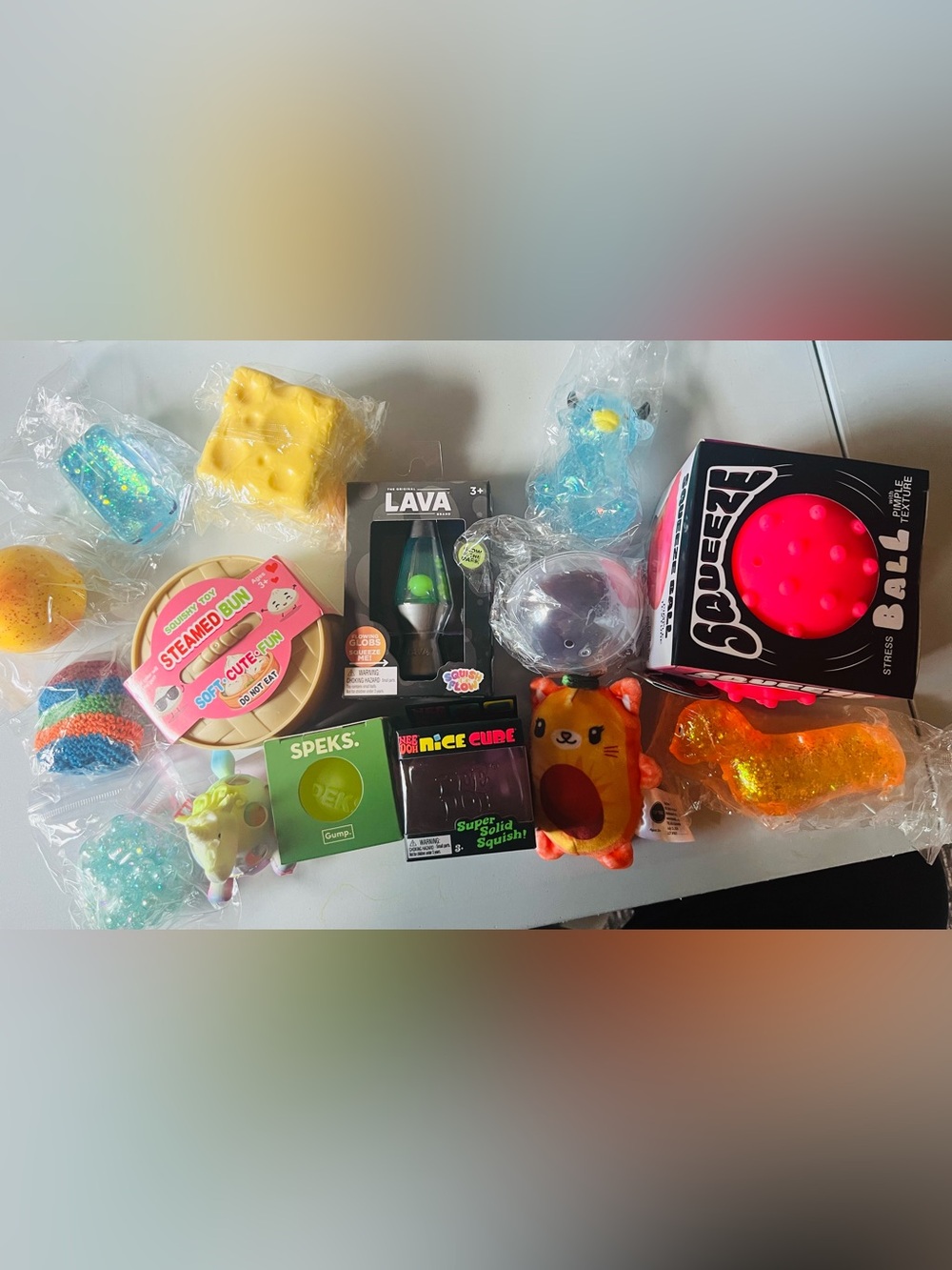 Large lot of squishy’s including Needoh, Speks, Top Trenz, Schilling and more